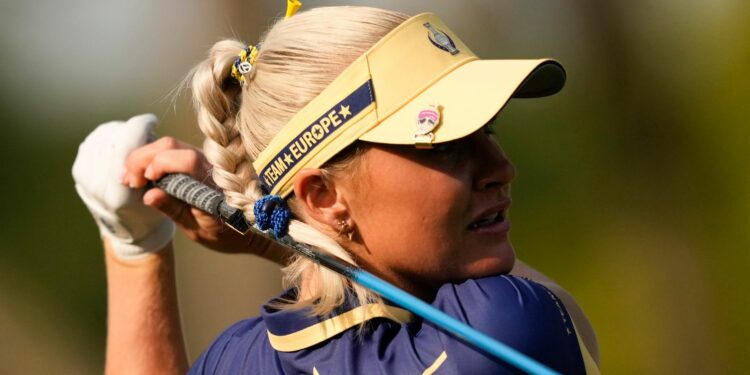 Europe's Charley Hull hits from the second tee during a Solheim Cup golf tournament singles match at the Robert Trent Jones Golf Club, Sunday, Sept. 15, 2024, in Gainesville, VA. (AP Photo/Matt York)