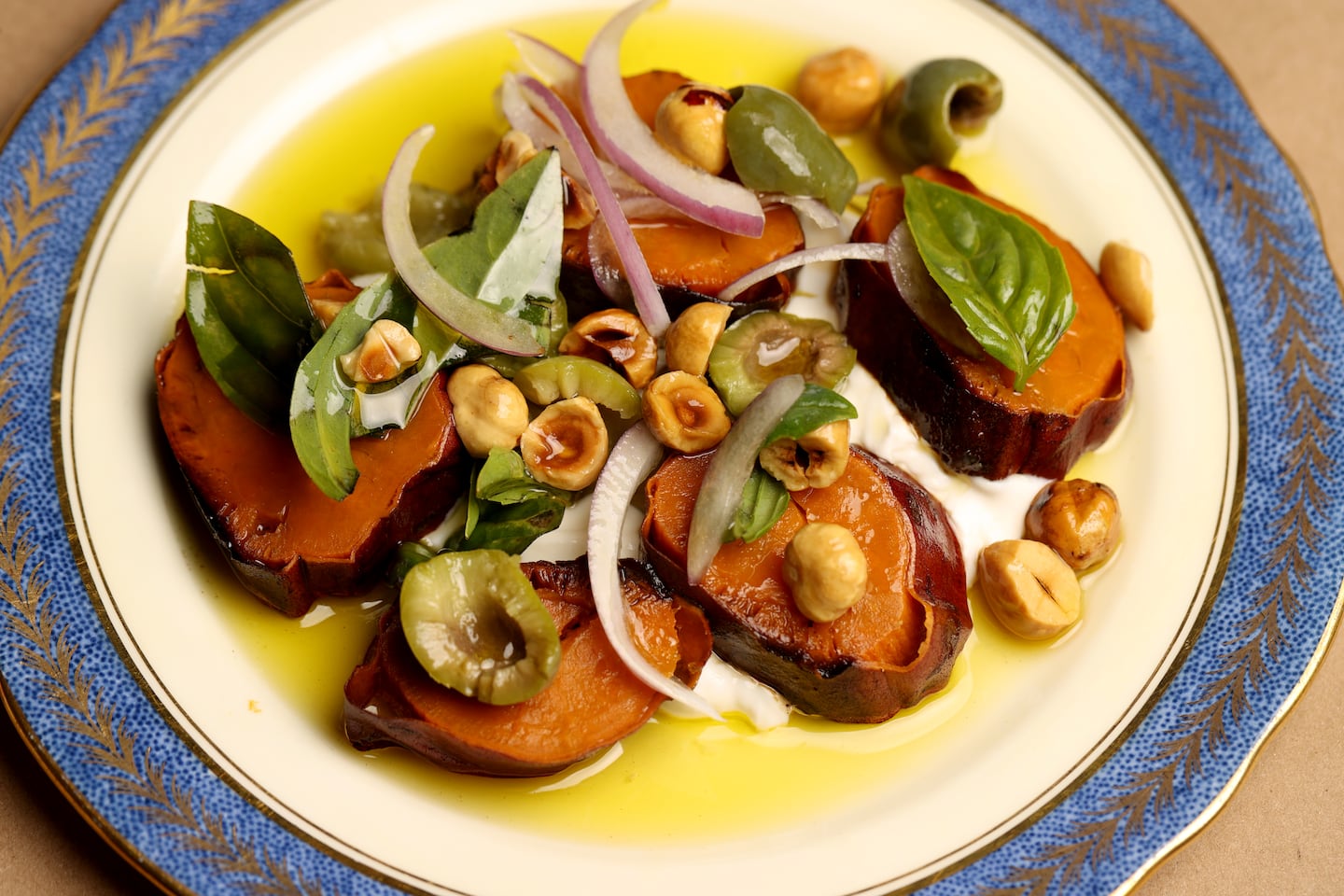 The roasted sweet potato dish from SALTY, which is served with whipped feta and olive hazelnut. 