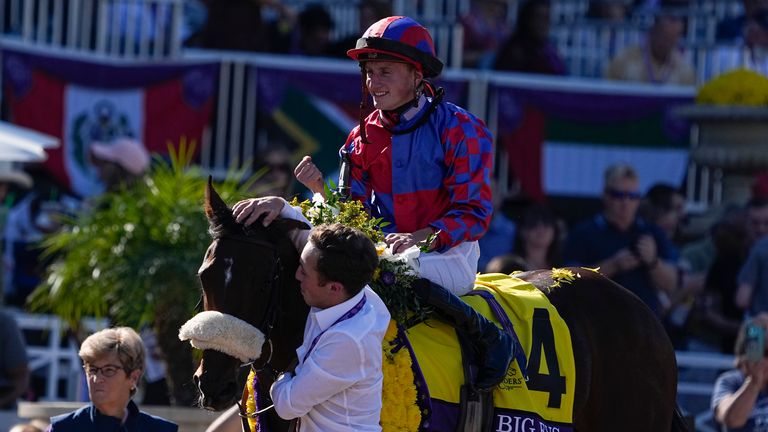 Tom Marquand celebrates atop Big Evs after winning the Breeders' Cup Juvenile Turf Sprint last year