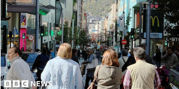 People walking in a shopping street in Andorra La Vella