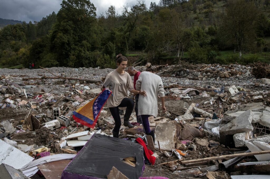 Bosnians pick up pieces after devastating flash floods kill 18