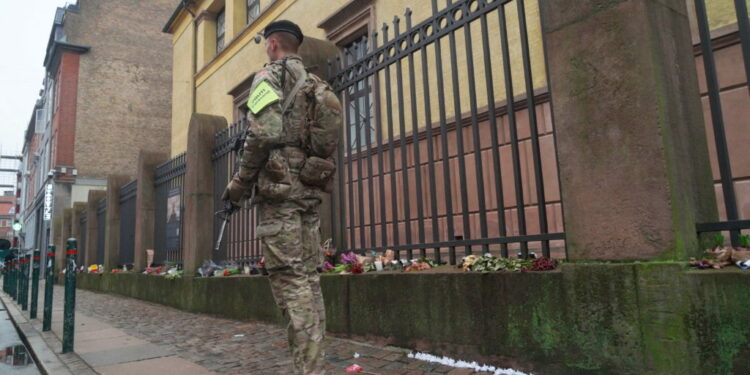 Danish soldiers help police guard the Great Synagogue in Copenhagen, Denmark, December 18, 2023. Photo by Tom Little/Reuters