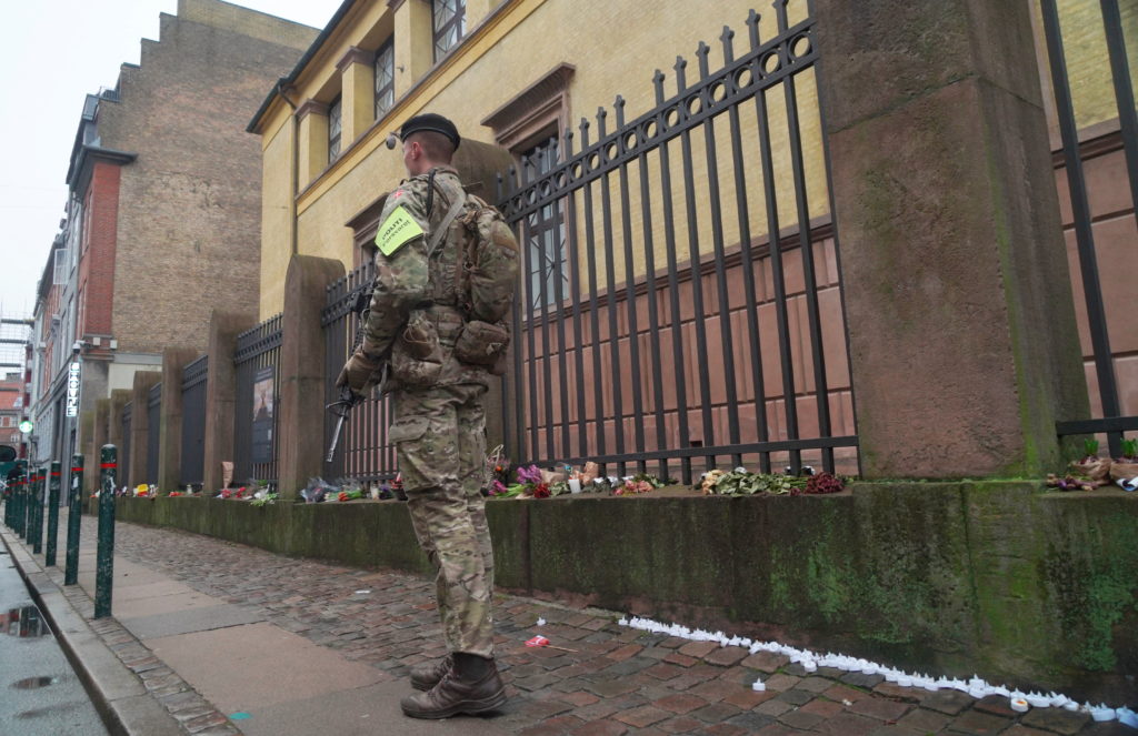 Danish soldiers help police guard the Great Synagogue in Copenhagen, Denmark, December 18, 2023. Photo by Tom Little/Reuters