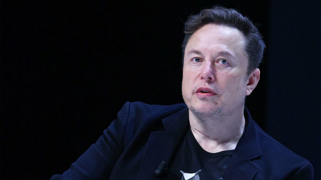 Elon Musk onstage at 'Exploring the New Frontiers of Innovation'