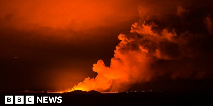 Eruption spews lava and cuts off road