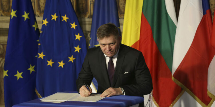 Slovakia's PM Fico signs a document during the EU leaders meeting on the 60th anniversary of the Treaty of Rome, in Rome