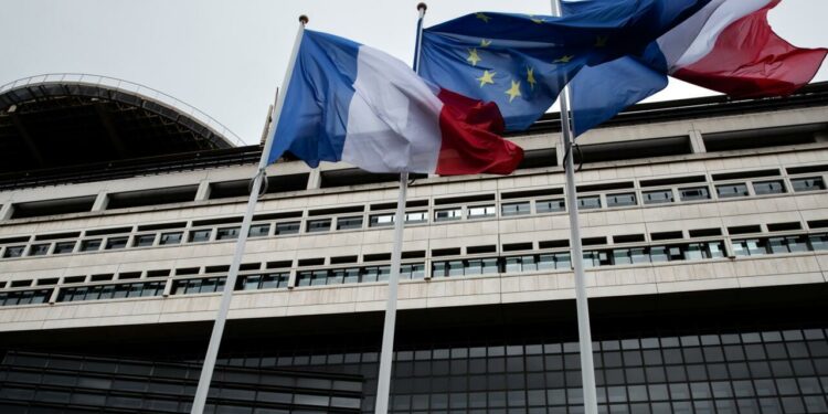 Fitch agency maintains France's 'AA-' credit rating but downgrades outlook