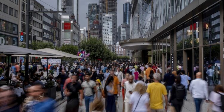 German consumer climate reaches 18-month high as income optimism rises