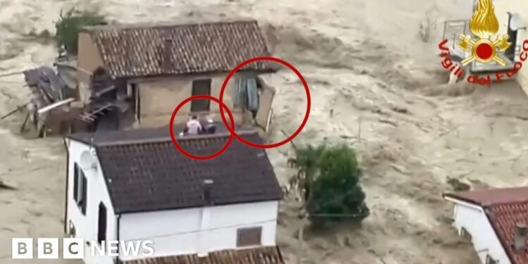 Helicopter rescues after floods overwhelm Italian town