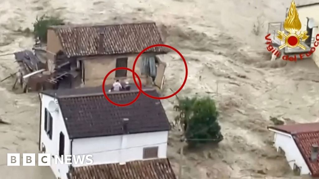 Helicopter rescues after floods overwhelm Italian town