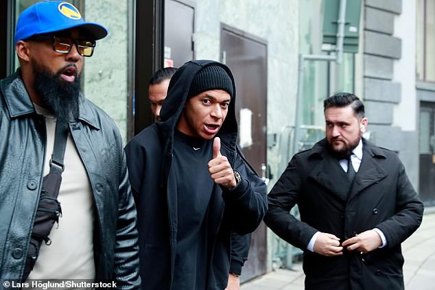 Kylian Mbappé leaves the Bank hotel where he has stayed during his visit to Stockholm in October. Swedish prosecutors have been looking into claims that he allegedly raped one of the women he met in the country during his stay