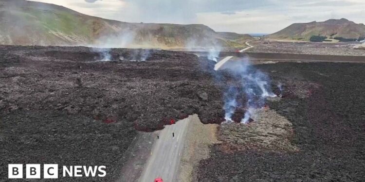 Lava engulfs road in Iceland