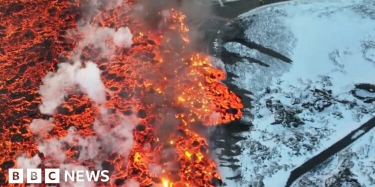 Lava flows over roads and bursts water pipe after Iceland eruption - BBC.com