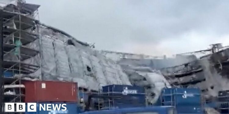 Moment Copenhagen stock exchange facade collapses - BBC.com