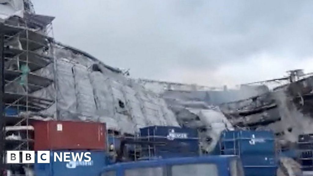 Moment Copenhagen stock exchange facade collapses - BBC.com