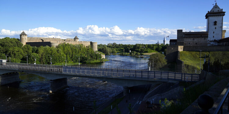 FILE - A bridge straddles Ivangorod, Russia, left, and a border crossing in Narva, Estonia (AP Photo, File)