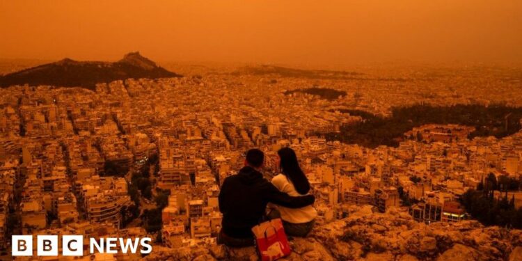 Orange Sahara dust haze descends over Athens