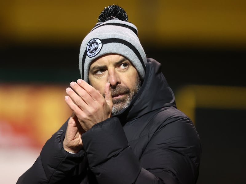 Larne’s manager Tiernan Lynch applauds the fans after the game. Photograph: Jonathan Porter/Inpho