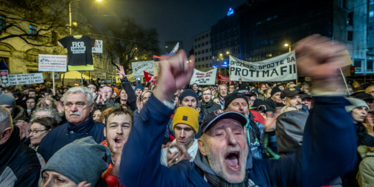 People take part in a demonstration in Bratislava, Slovakia