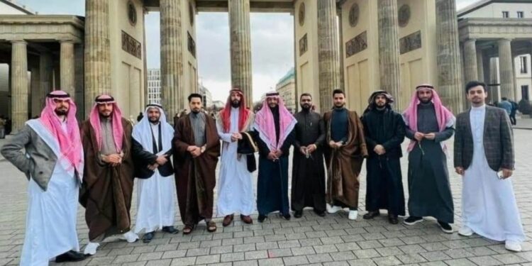 A group of Syrian tribesmen in front of the Brandenburg Gate in the German capital, Berlin - April 2022 (Germany News/Facebook)