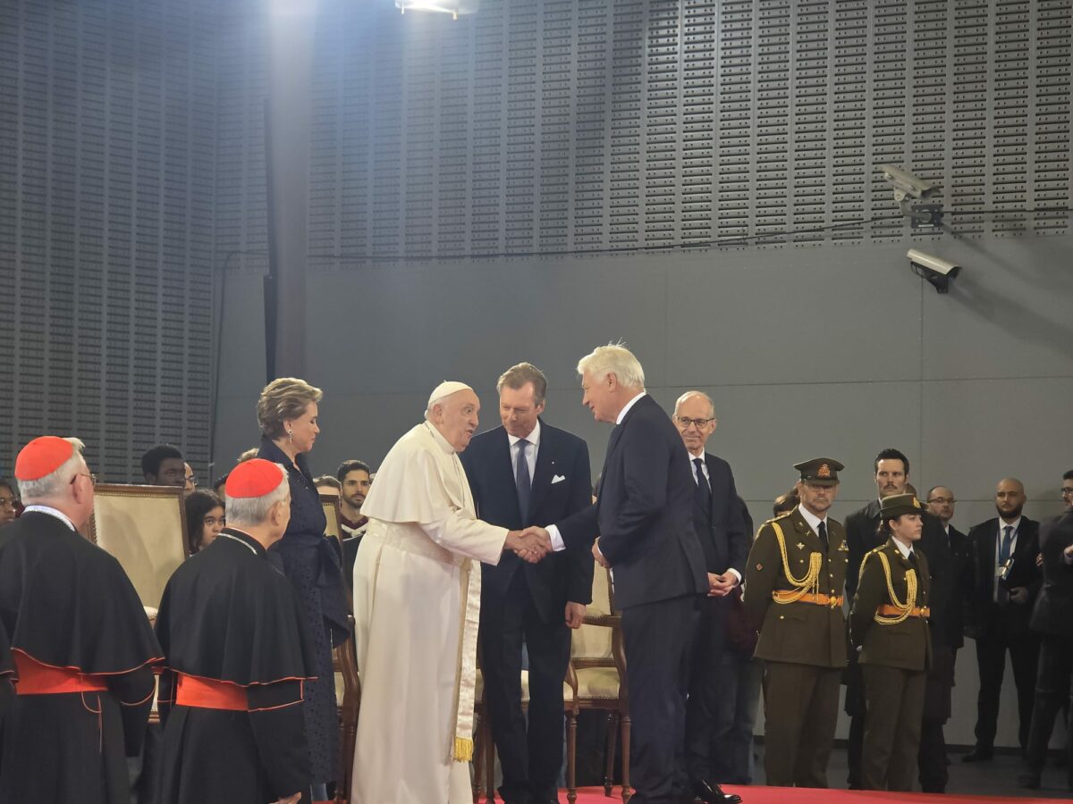 Pope Francis shakes the hand of Claude Wiseler, a member of the Luxembourg Chamber of Deputies on Sep. 26, 2024. To his immediate left is the Grand Duke Henri, and to the left of the Duke is the prime minister, Luc Frieden. (Credit: Elise Ann Allen/Crux.)