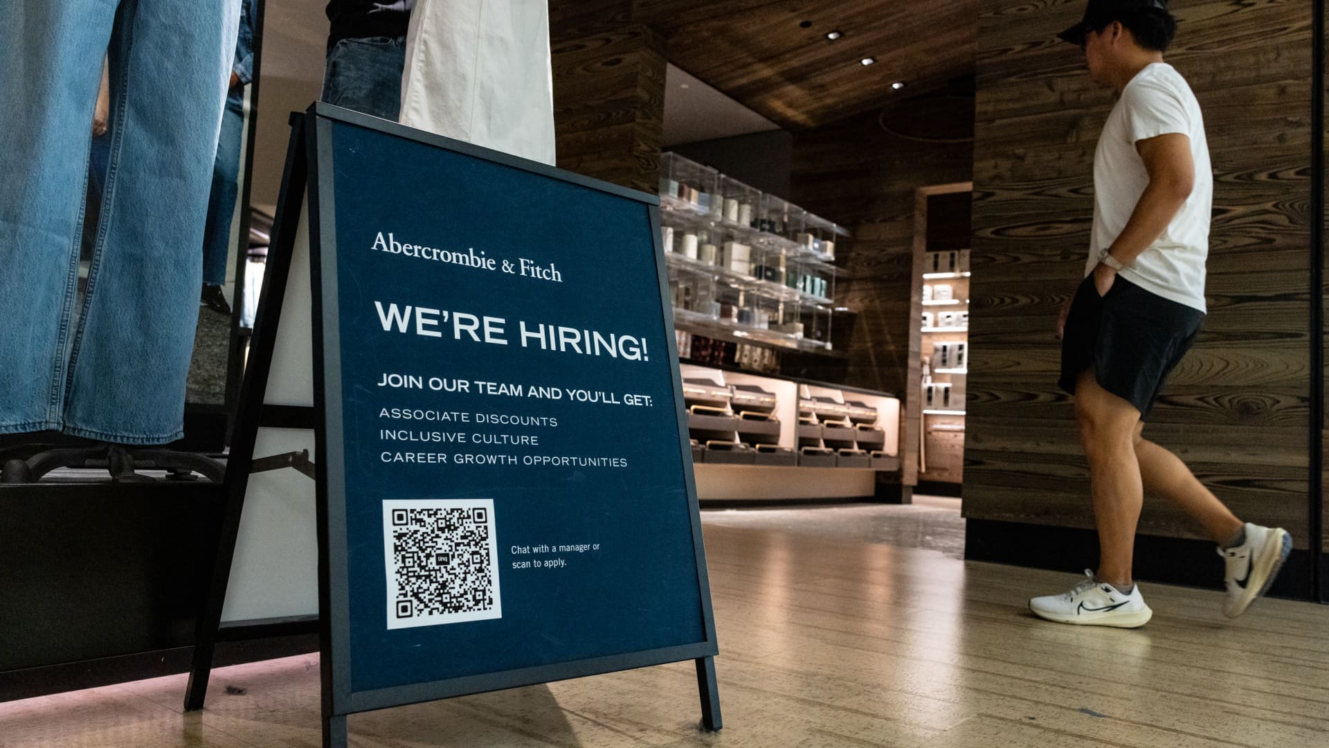 A jobseeker holds flyers during the New York Public Library's annual Bronx Job Fair & Expo at the the Bronx Library Center in the Bronx borough of New York, US, on Friday, Sept. 6, 2024. 