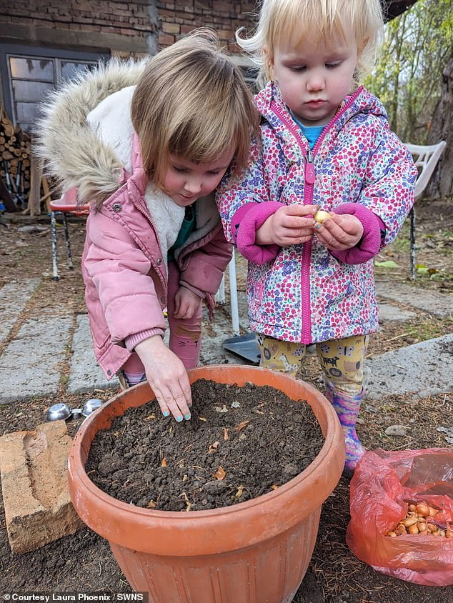 The couple found and bought an abandoned three-bedroom property in Strazhitsa for £7,000 after selling their two-bedroom house in the UK for £85,000. Pictured, Laura and Anthony Phoenix's daughters Cecelia and Nova