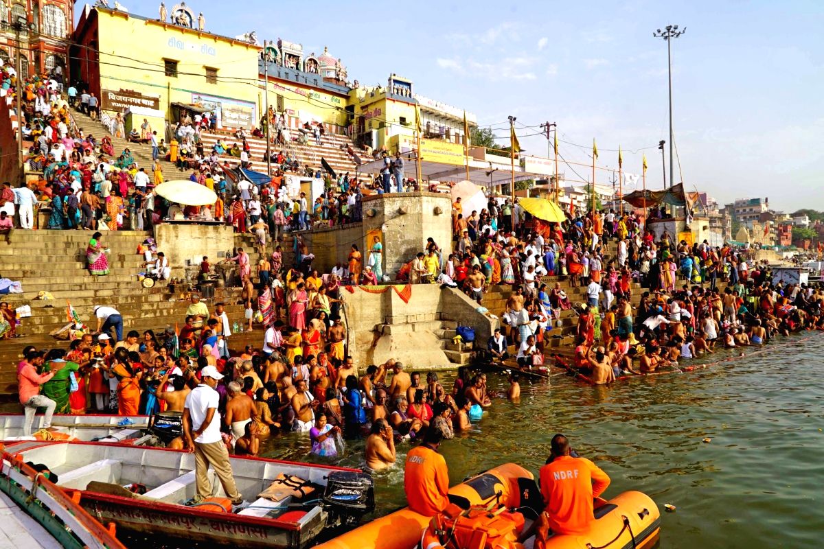 Varanasi : Devotees take a holy dip at Dashashwamedh Ghat on the occasion of Akshaya Tritiya in Varanasi on Saturday, April 22, 2023.