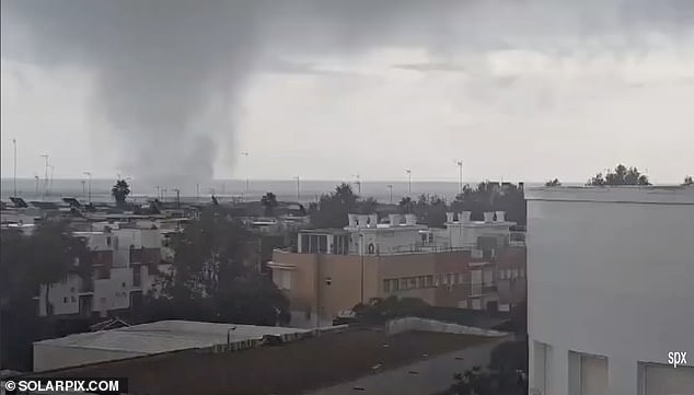 The terrifying tornado waterspout was captured in the Costa de la Luz resort of Isla Cristina