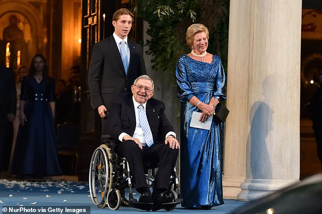 Prince Constantine Alexios of Greece and Denmark with his late grandfather King Constantine II and grandmother Queen Anne-Marie in 2021