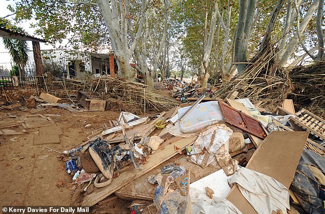 Huge amounts of flood damage caused to a row of houses in Cheste by the flash flood