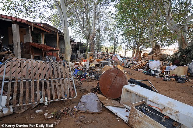 The stream that normally flows gently through the town along the Poyo ravine was transformed into a raging cascade. (Damaged buildings in Cheste)