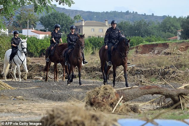 Mounted civil guards search for victims in Cheste, region of Valencia, eastern Spain