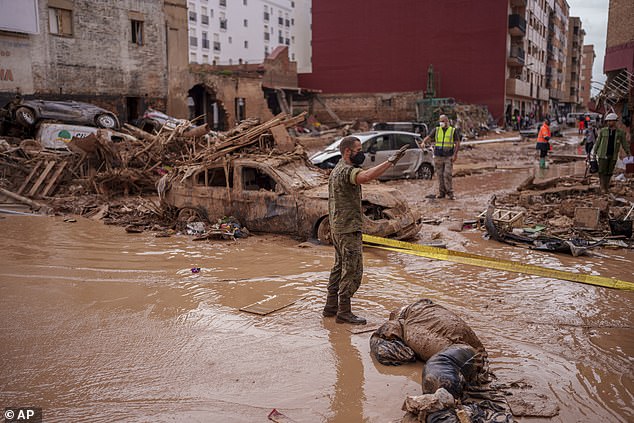 A soldier works in an area affected by floods in Catarroja, Spain on November 3, 2024