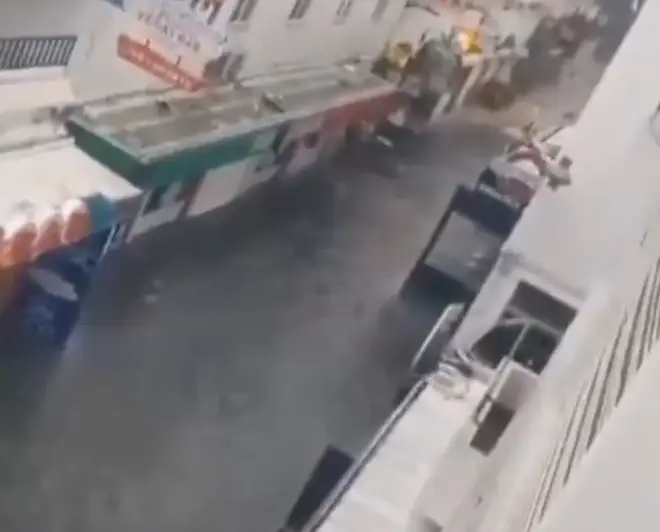 Videos have been shared on social media showing water gushing through downtown Albufeira