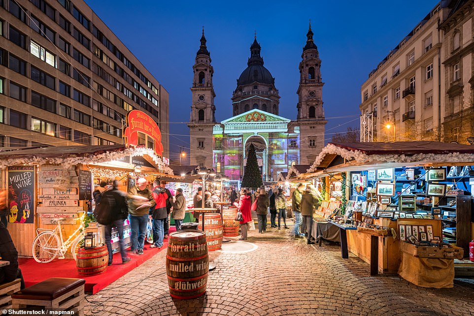 Above, the Christmas market in front of St Stephen's Basilica in Budapest, Hungary