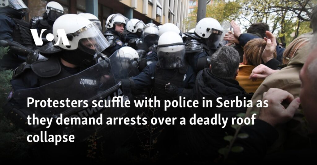 Protesters scuffle with police in Serbia as they demand arrests over a deadly roof collapse