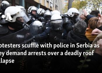 Protesters scuffle with police in Serbia as they demand arrests over a deadly roof collapse