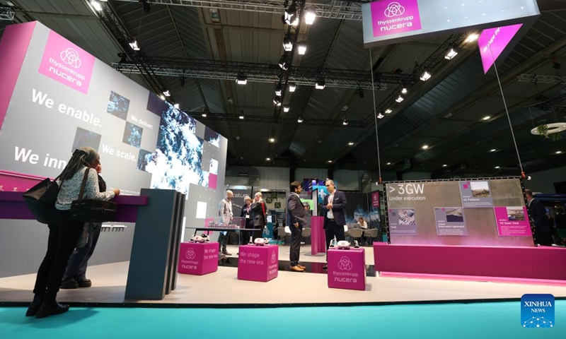 People attend an exhibition during the European Hydrogen Week in Brussels, Belgium, on Nov. 18, 2024. The European Hydrogen Week, the European Union's policy conference and business forum for the hydrogen sector, kicked off in Brussels on Monday. (Photo: Xinhua)