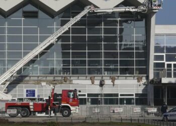A silent protest in Serbia demands accountability for a roof collapse that killed 14