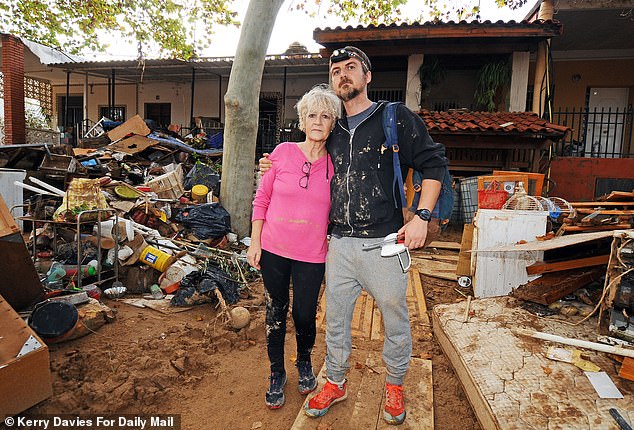 David Fraile, 41, and his mother Mari,67,at her house in the area of Cheste which sustained huge amounts of flood damage