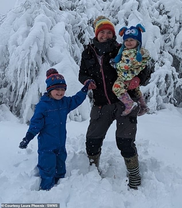 Laura Phoenix, 33, and her husband Anthony, 32, moved 1,941 miles from Darlington, County Durham, to Strazhitsa, Bulgaria, in September 2023 with their daughters ¿ Cecelia, four, and Nova, two. Pictured, Laura Phoenix with her daughters Cecelia and Nova during a Bulgarian winter