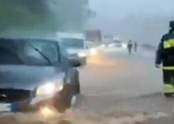 Firefighters rescue drivers in Italy from torrential floods Firefighters rescue drivers in Italy from torrential floods