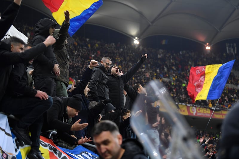 Romanian fans during the Nations League match against Kosovo in Bucharest. Photograph: Alex Nicodim/NurPhoto via Getty Images