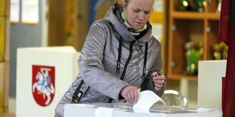 Lithuania holds run-off election with opposition seeking to cement win