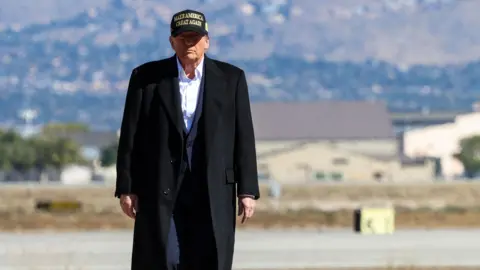 Reuters Republican presidential nominee and former U.S. President Donald Trump walks as he arrives at Albuquerque International Sunport, in Albuquerque, New Mexico