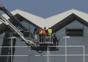Prosecutors in Serbia arrest 12 people over roof collapse at train station that killed 15