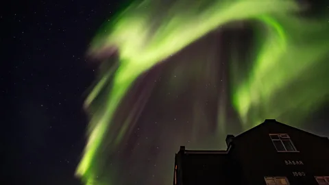 Alamy The Northern Lights regularly appear in Grímsey during the long winter nights (Credit: Alamy)