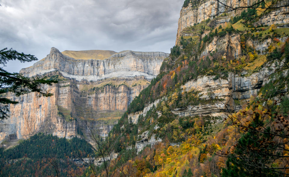 Autumn landscape in the Ordesa y Monte Perdido national park in the Pyrenees, in Huesca, Aragon, Spain, with high mountains