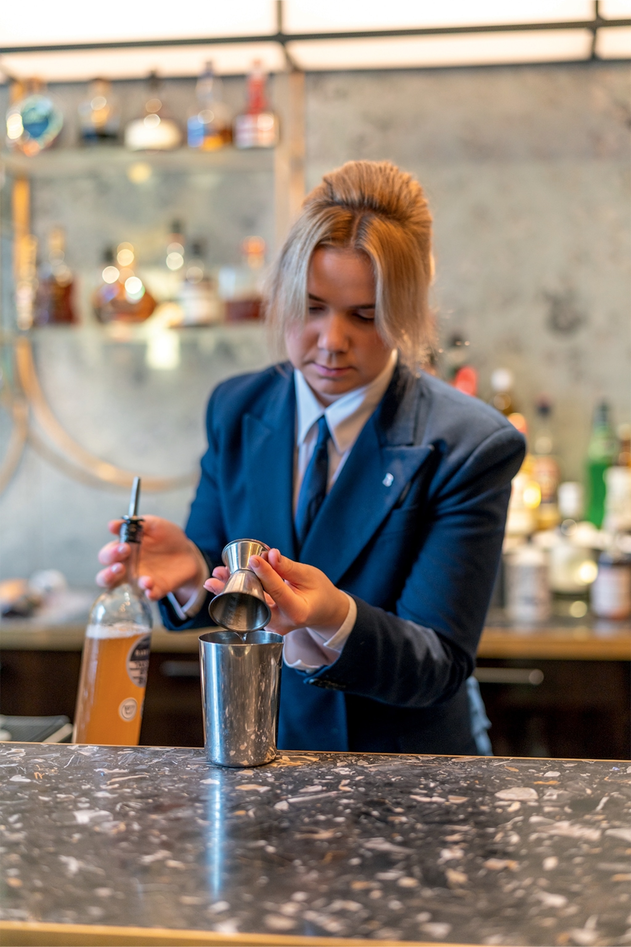 Bartender serving cocktails